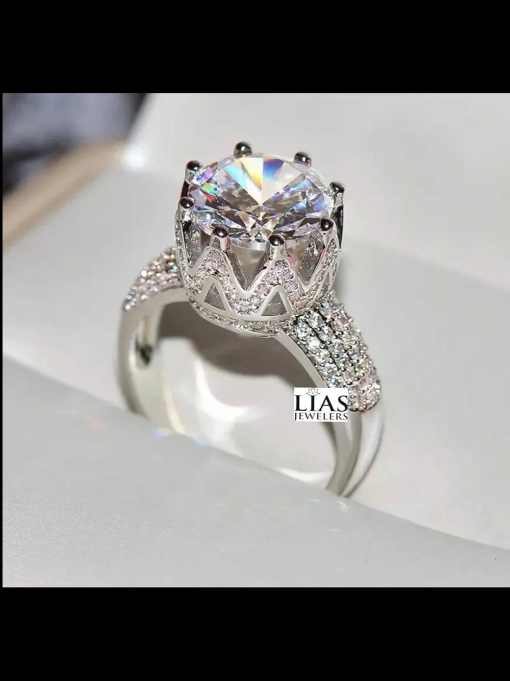 New 18k white gold engagement ring